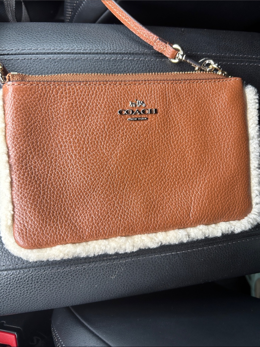 Coach Tan Pebbled Leather Wristlet with Cream Shearling Trim